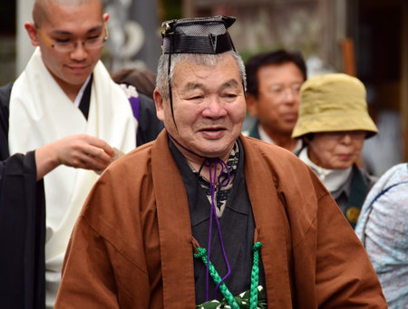 Mount Koya, Japan - June 14, 2011: Elderly Japanese man wearing traditional clothes during Aoba festival, an annual event celebrating the birthday of Kobo Daishi (Kukai)のeditorial素材