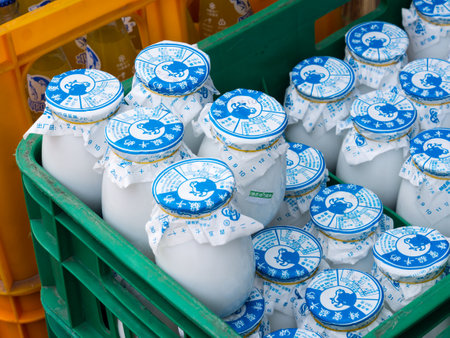 Beijing, China - March 8, 2015: Beijing yogurt being sold on the streets in the morningのeditorial素材