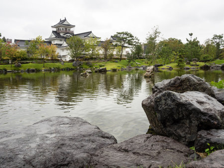 Toyama castle reflected in the pond of traditional Japanese gardenのeditorial素材