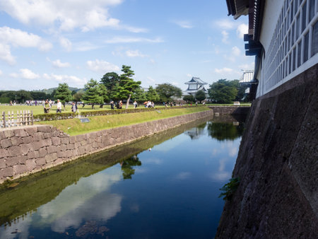 Kanazawa, Japan - September 28, 2015: Tourists walking along the moat of historic Kanazawa castleのeditorial素材