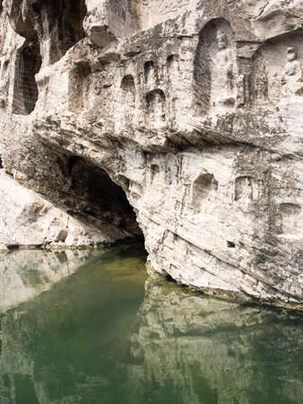 Caves with buddhist carvings at Longmen grottoes, Chinaの写真素材