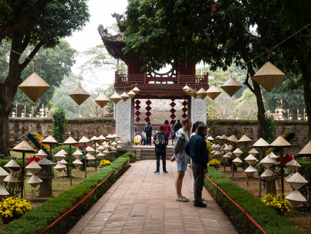 Hanoi, Vietnam - March 7, 2016: Visitors at the courtyard of the temple of literatureのeditorial素材