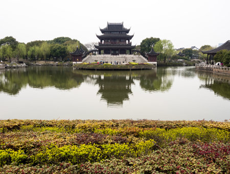 Suzhou, China - March 21, 2016: Chinese pavilion reflected in lake at Ruiguang pagoda parkのeditorial素材