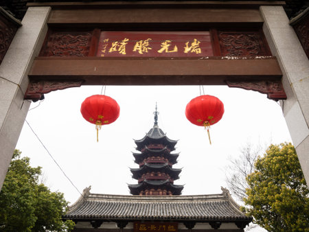 Suzhou, China - March 21, 2016: Entrance to Ruiguang park with Ruiguang Pagoda at the backgroundのeditorial素材