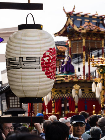 Takayama, Japan - October 9, 2015: Crowded old town street with decorative floats on display during annual Takayama Autumn Festival, one of the most famous festivals in Japanのeditorial素材