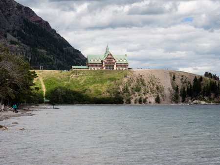 Waterton Lakes National Park, Canada - July 6, 2016: Historic Prince of Wales hotel under stormy skyのeditorial素材