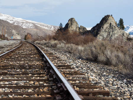 Railroad tracks running along the Columbia river valley north of Wenatchee, Eastern Washington state