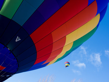 Winthrop, WA, USA - March 4, 2017: Colorful hot air ballons against blue sky at Winthrop Balloon Festivalのeditorial素材