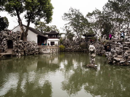 Suzhou, China - March 23, 2016: Rocks and pond in Lion Grove Garden, a classical Chinese garden and part of Unesco World Heritage in Suzhouのeditorial素材