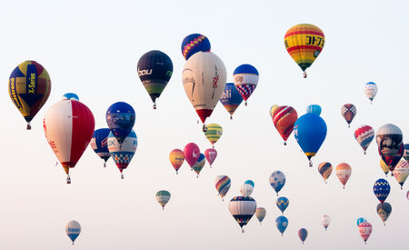 Saga, Japan - November 4, 2016: Dozens of hot air balloons in the sky during early morning competition at Saga International Balloon Fiestaのeditorial素材