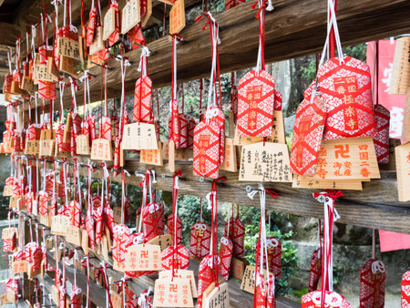 Naruto, Japan - April 2, 2018: Ema tablets with worshippers wishes on the grounds of Gokurakuji, temple 2 of Shikoku pilgrimageのeditorial素材