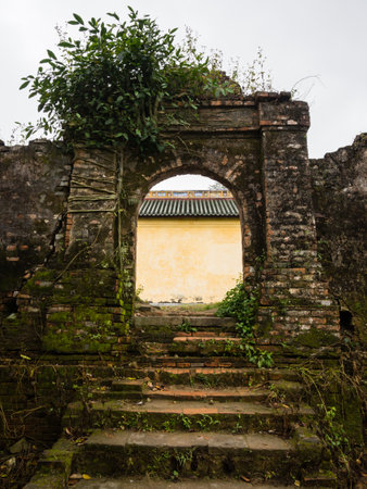 Hue, Vietnam - March 11, 2016: On the grounds of Imperial City of Hue, the former residence of Vietnam's rulers and Unesco World Heritage site. The palace suffered heavy damage during Vietnam War and is now being gradually reconstructedのeditorial素材