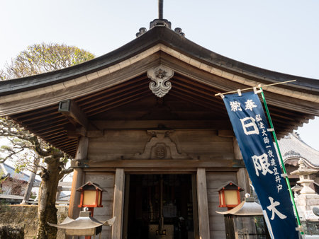 Tokushima, Japan - April 3, 2018: Pavilion housing a sacred well on the grounds of Idoji, temple number 17 of Shikoku pilgrimage