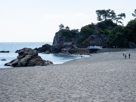 Kochi, Japan - April 7, 2018: Katsurahama beach with Shimoryuzu cape and Ryuogu Shrine at the backgroundのeditorial素材