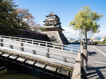 Wooden bridge across the moat leading to historic Takashima castle in Suwa - Nagano prefecture, Japanのeditorial素材