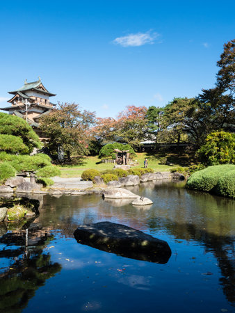 Traditional Japanese public garden with pond near reconstructed Takashima castle in Suwa, Nagano prefecture, Japanのeditorial素材