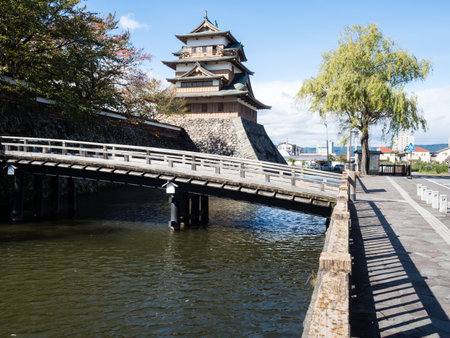 Wooden bridge across the moat leading to historic Takashima castle in Suwa - Nagano prefecture, Japanのeditorial素材