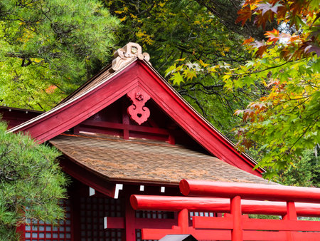 Kiso, Nagano prefecture, Japan - October 23, 2017: Red shinto shrine on the grounds of Kozenji templeのeditorial素材