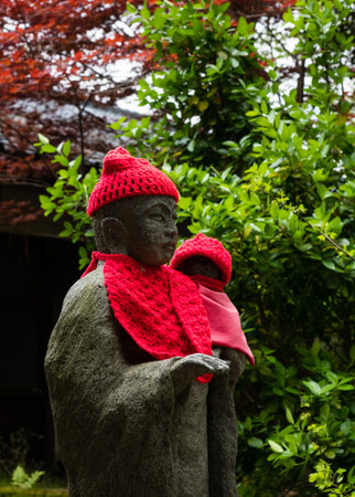 Matsuyama, Ehime prefecture, Japan - April 10, 2018: Stone Buddhist statue on the grounds of Joruriji, temple number 46 of Shikoku pilgrimageのeditorial素材