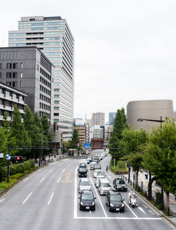 Tokyo, Japan - August 19, 2018: View of Yasukuni-dori Avenue near the entrance to Yasukuni Shrine on a weekdayのeditorial素材