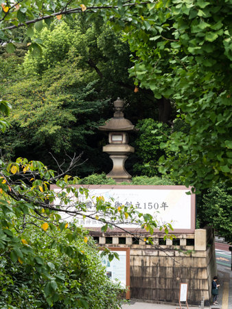 Tokyo, Japan - August 19, 2018: Stone lantern and memorial plaque at the entrance to Yasukuni Shrineのeditorial素材