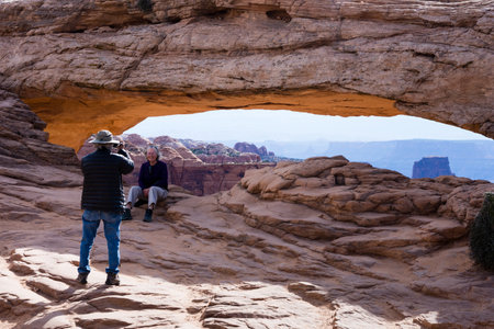 Moab, Utah - April 23, 2017: Tourists taking pictures at Mesa Arch in Canyonlands National Parkのeditorial素材