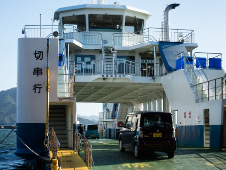 Hiroshima, Japan - August 24, 2018: Vehicles boarding the Etajima ferry bound for Kirikushi at Ujina terminal of Hiroshima portのeditorial素材