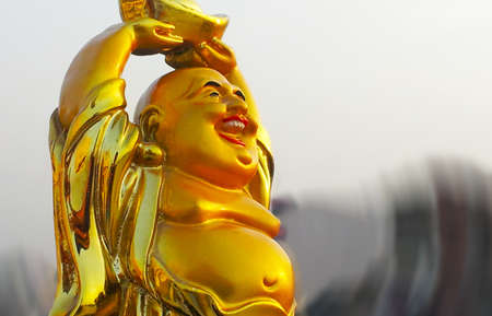 Laughing Golden Buddhaの写真素材