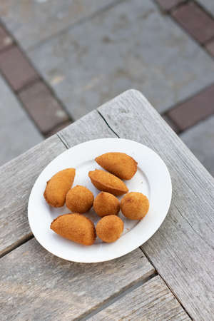 Salgados Brazilian fried snacks, party finger food fried snack, stuffed with chicken, cheese, cornの写真素材