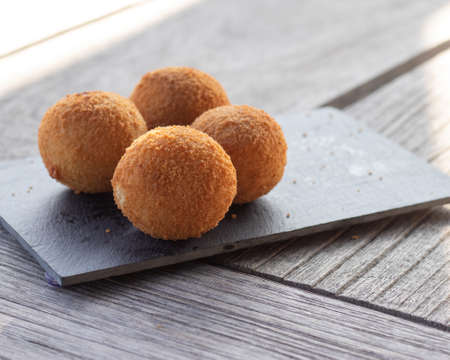 Bolinhas de queijo, a brazilian party finger food fried snack, stuffed with cheese