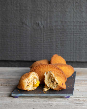 Risoles, brazilian party finger food fried snack, stuffed with chicken, more corn, deep fried,...