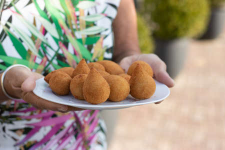 Salgados Brazilian fried snacks, party finger food fried snack, stuffed with chicken, cheese, cornの写真素材