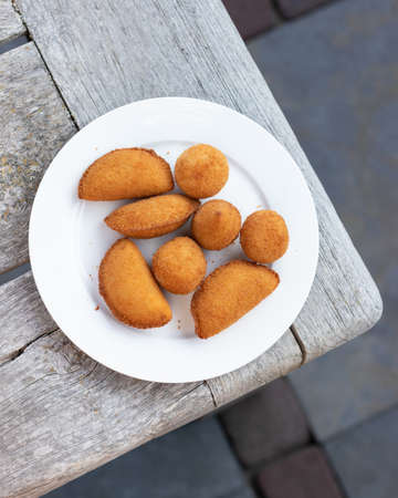 Salgados Brazilian fried snacks, party finger food fried snack, stuffed with chicken, cheese, cornの写真素材