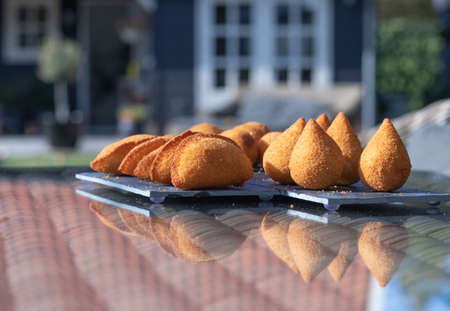 Salgados Brazilian fried snacks, party finger food fried snack, stuffed with chicken, cheese, cornの写真素材