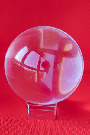powerful, seeing magic sphere, strange forms, images inside a Cristal ball, concept of mental power, distortion by round glass ball, visionsの写真素材