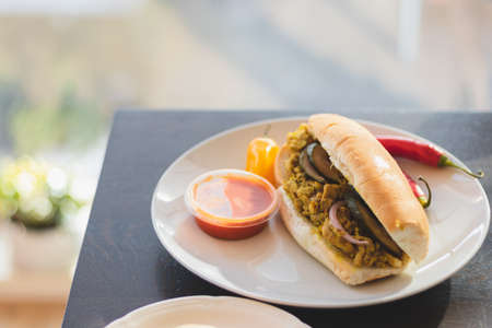 Curry chicken sandwich in a plateの写真素材