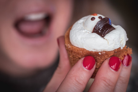 Mini cake with snowman on a little plateの写真素材
