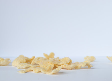 Soft fried potato chips that fades into a smooth blur on a white background