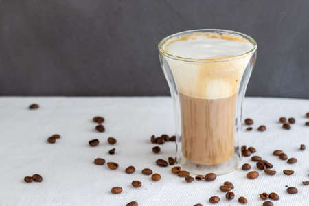 A double glass cup of cappuccinoの写真素材