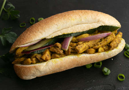 chicken curry Sandwich with saladの写真素材