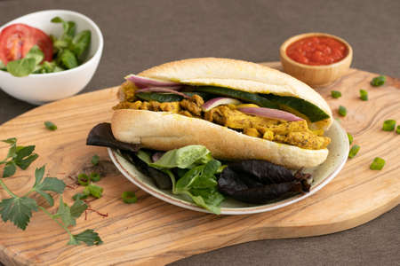 chicken curry Sandwich with saladの写真素材