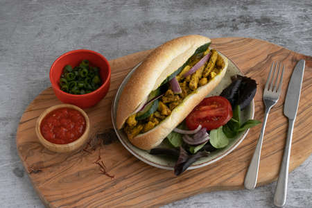 chicken curry Sandwich with saladの写真素材