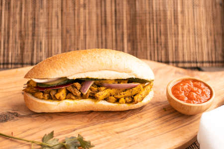 chicken curry Sandwich with saladの写真素材