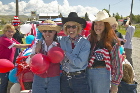Three women dressed for the Fourth of July in Lima Montanaのeditorial素材