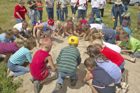 Group of children playing a game in the sandのeditorial素材
