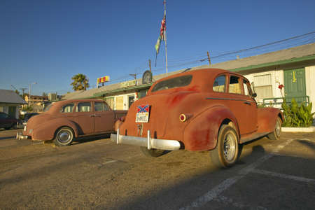 Historic vintage roadside motel on old Route 66 welcomes old cars and guests in Barstow Californiaのeditorial素材