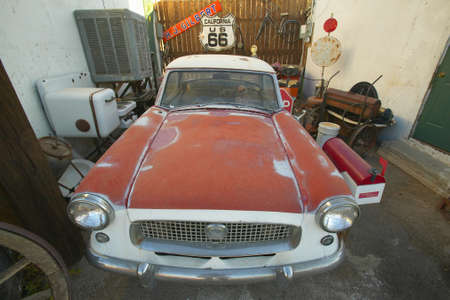 Historic vintage roadside motel on old Route 66 welcomes old cars and guests in Barstow Californiaのeditorial素材