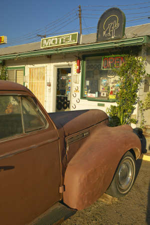 Historic vintage roadside motel on old Route 66 welcomes old cars and guests in Barstow Californiaのeditorial素材