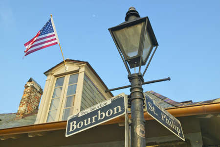Bourbon Street and St. Philips Street and Lamp post in French Quarter of New Orleans, La.のeditorial素材