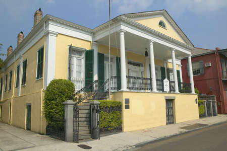 Historic old yellow home in French Quarter of New Orleans, Louisianaのeditorial素材